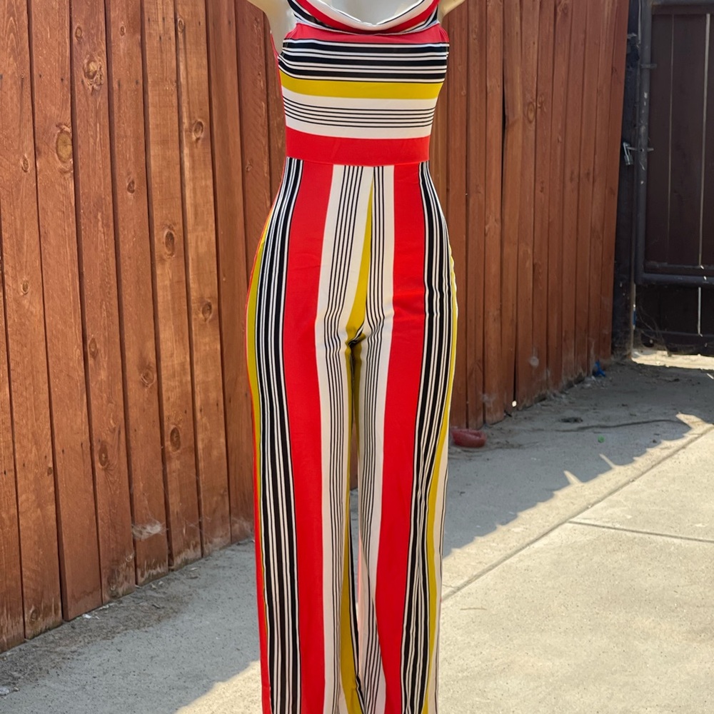 FashionNova jumpsuit size medium.. cleaning out clothes. New with tags